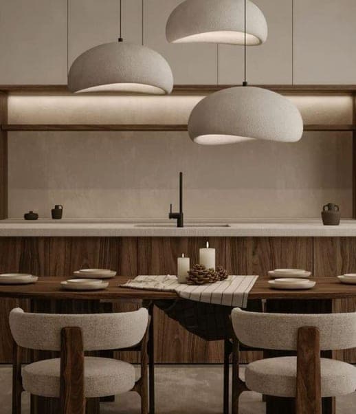 Kitchen and dining with sculptural pendants